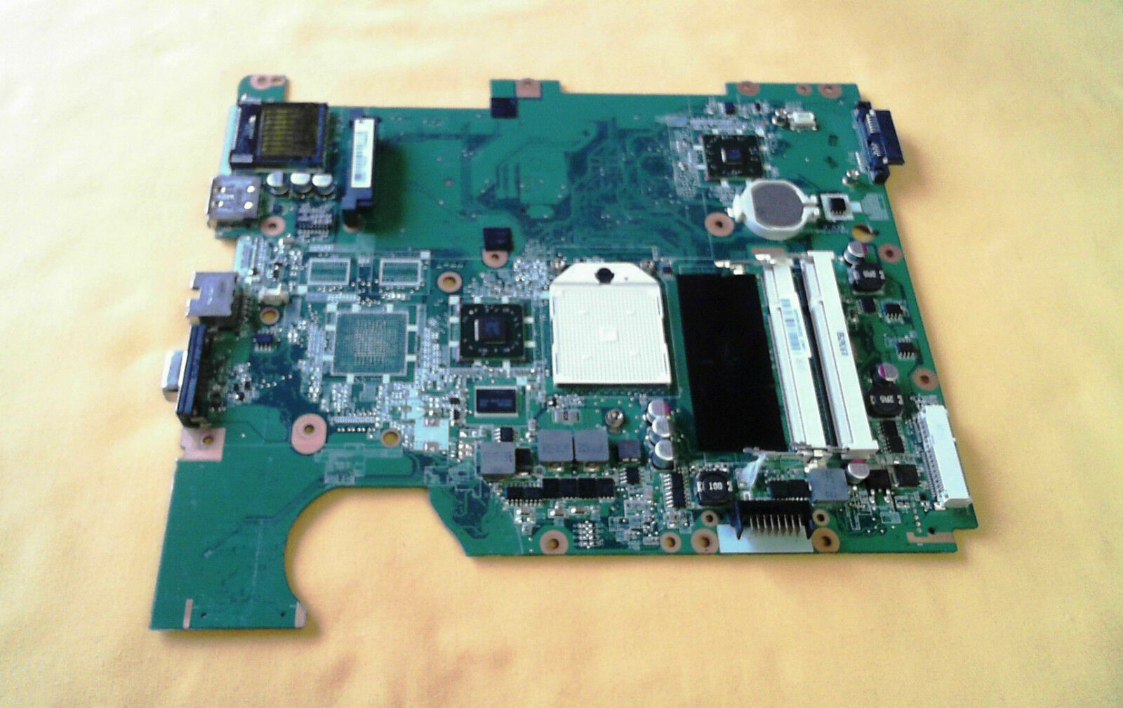 Compaq CQ61 Genuine Motherboard 577064-001 Nice NO HDMI port Buy HALF Bottom, instead of just motherboar